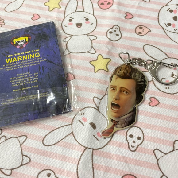 Lollipop Chainsaw Promo Items Inflatable Chainsaw and Metal Nick Head Keychain - Picture 13 of 16